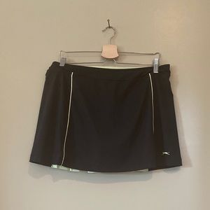 Lime green and black Slazenger skort.